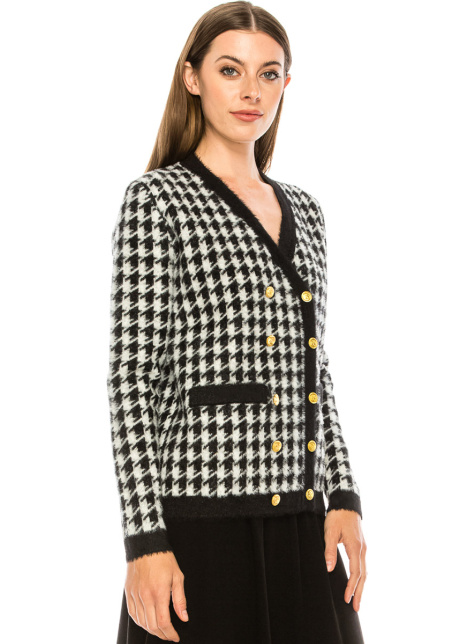A houndstooth print cardigan with accent details
