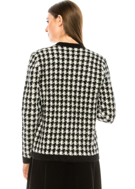 A houndstooth print cardigan with accent details