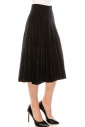 Pleated black skirt with golden accents
