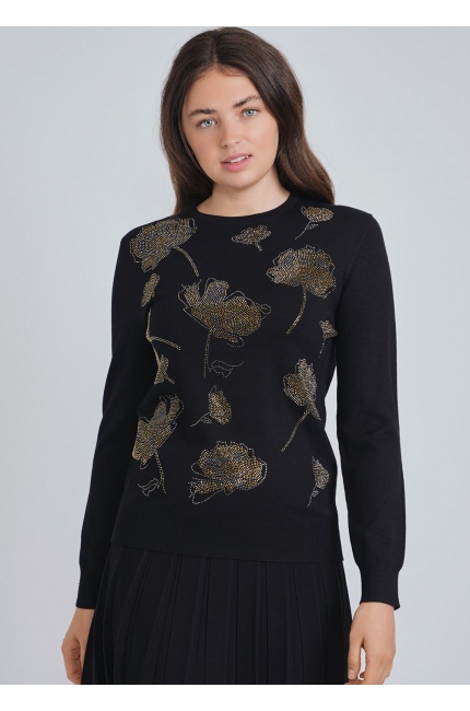 Glistening Flower Patterns on Black Knit Top
