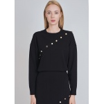 Chic Black Knit with Decorative Button Accents