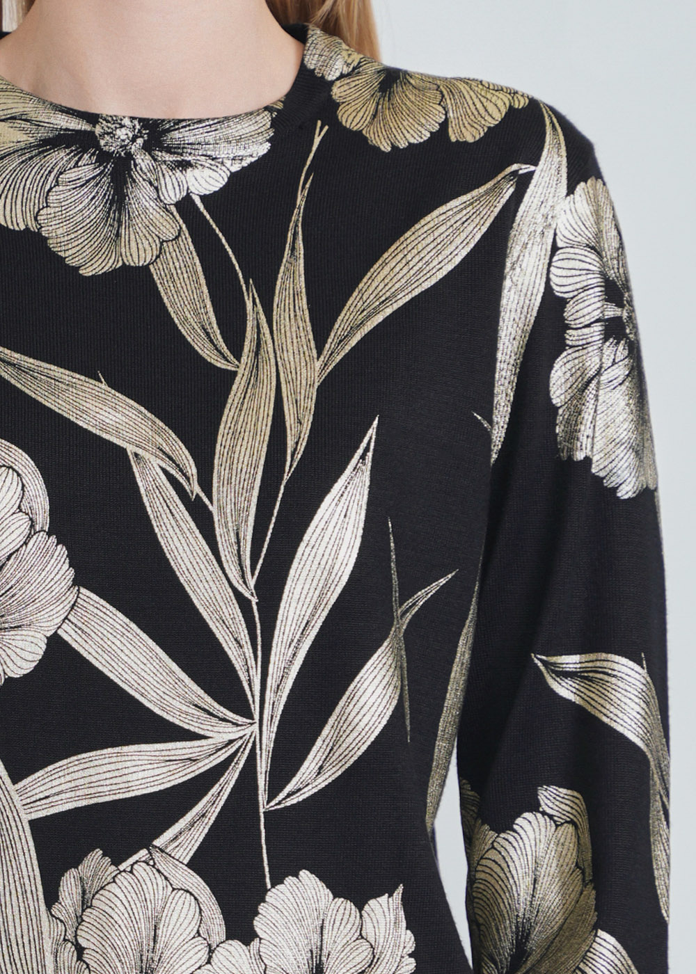 Timeless Beauty: Black Knit with Golden Floral Impressions