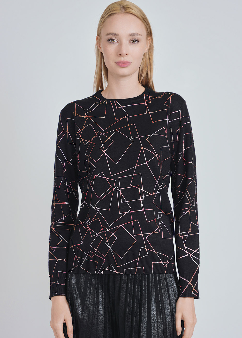 Knit Intrigue: Black Sweater with Geometric Panache