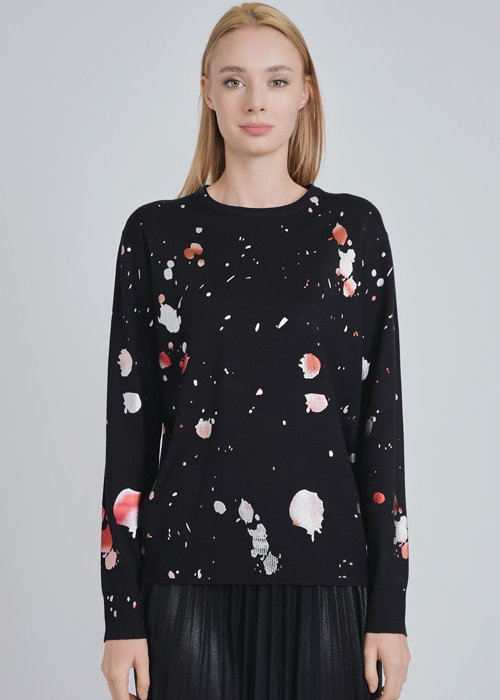 Unique Spotted Patterns on Black Knit Sweater