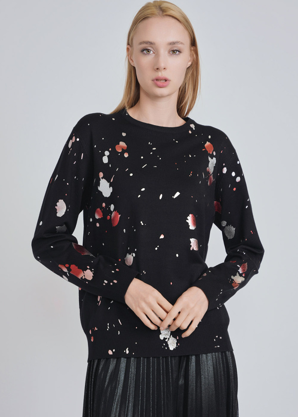 Unique Spotted Patterns on Black Knit Sweater