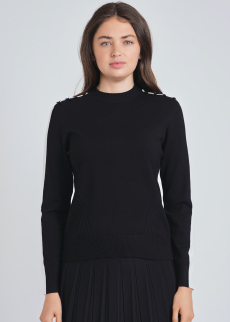 Distinctive Black Knit with Eye-Catching White Sleeve Bands