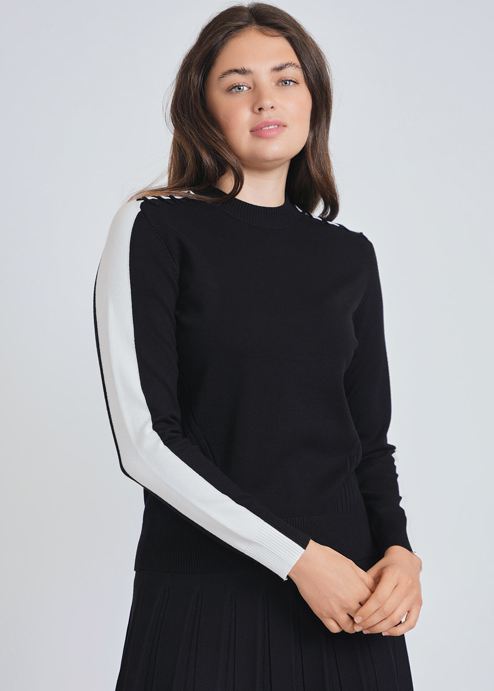 Distinctive Black Knit with Eye-Catching White Sleeve Bands