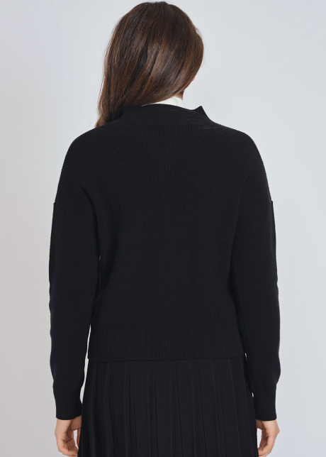 Essence of Style: Black Knit with Leather Hints