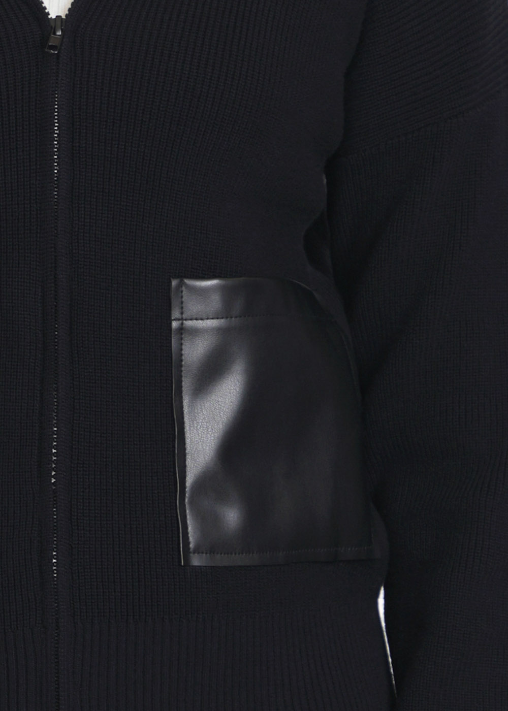 Essence of Style: Black Knit with Leather Hints