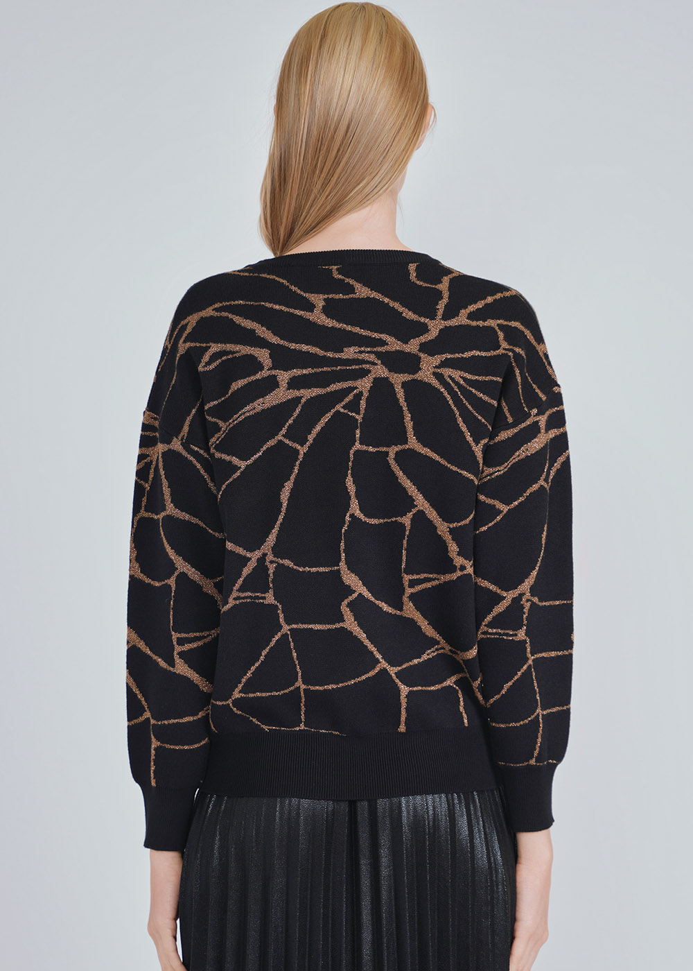 Black Knitwear with Whispered Gold Detail