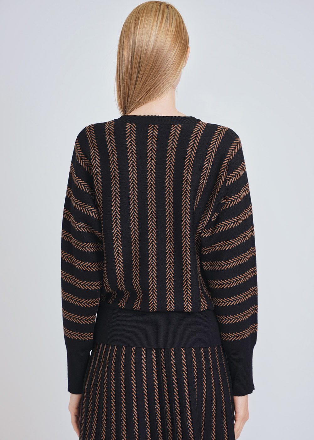 Refined Black Knit with Camel Features