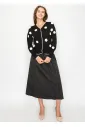 Black Cardigan with White Flower Accents
