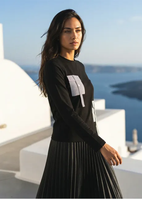 Minimal Black Outfit with Graphic Detail Top