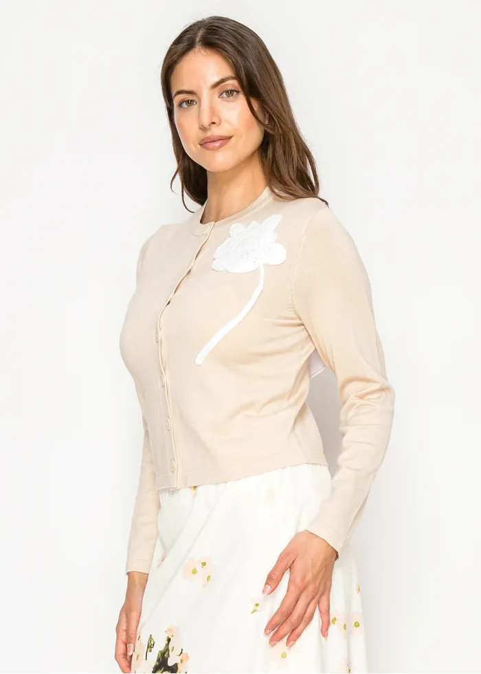 Timeless beige knit cardigan with floral detail