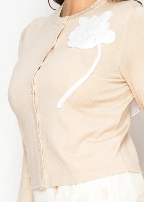 Timeless beige knit cardigan with floral detail
