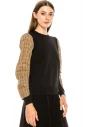 Black sweater with checkered sleeves